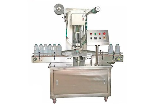 KIS-1800 Rotary Type Milk Bottle Sealing Machine