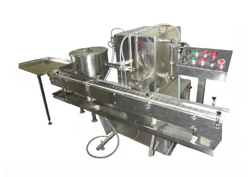 Automatic Two Head Volumetric Liquid Filling Machine 