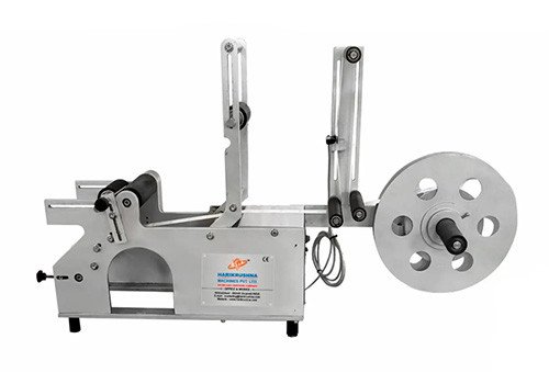 HMPL–SLTT–RD Semi-Automatic Tabletop Sticker Labelling Machine for Round Bottles